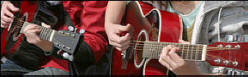 Midwest Music = group guitar lesson